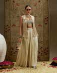 Magnolia Cream Threadwork Fringe Jacket Paired Wth Metallic Bustier And Ivory Embellised Flared Pants