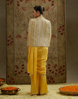 Dandelion Yellow Cascade Saree Paired With Metal Embellished Bustier And Embellished Cape Jacket