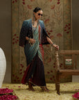 Red Blue Ombre Print Cascade Saree With Metal Embellished Bustier Paired With Blue Ombre Embellished Cape  Jacket