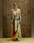 Multi Colored Metallic Cape Jacket Paired With Stripe Printed Bustier And Drape Skirt